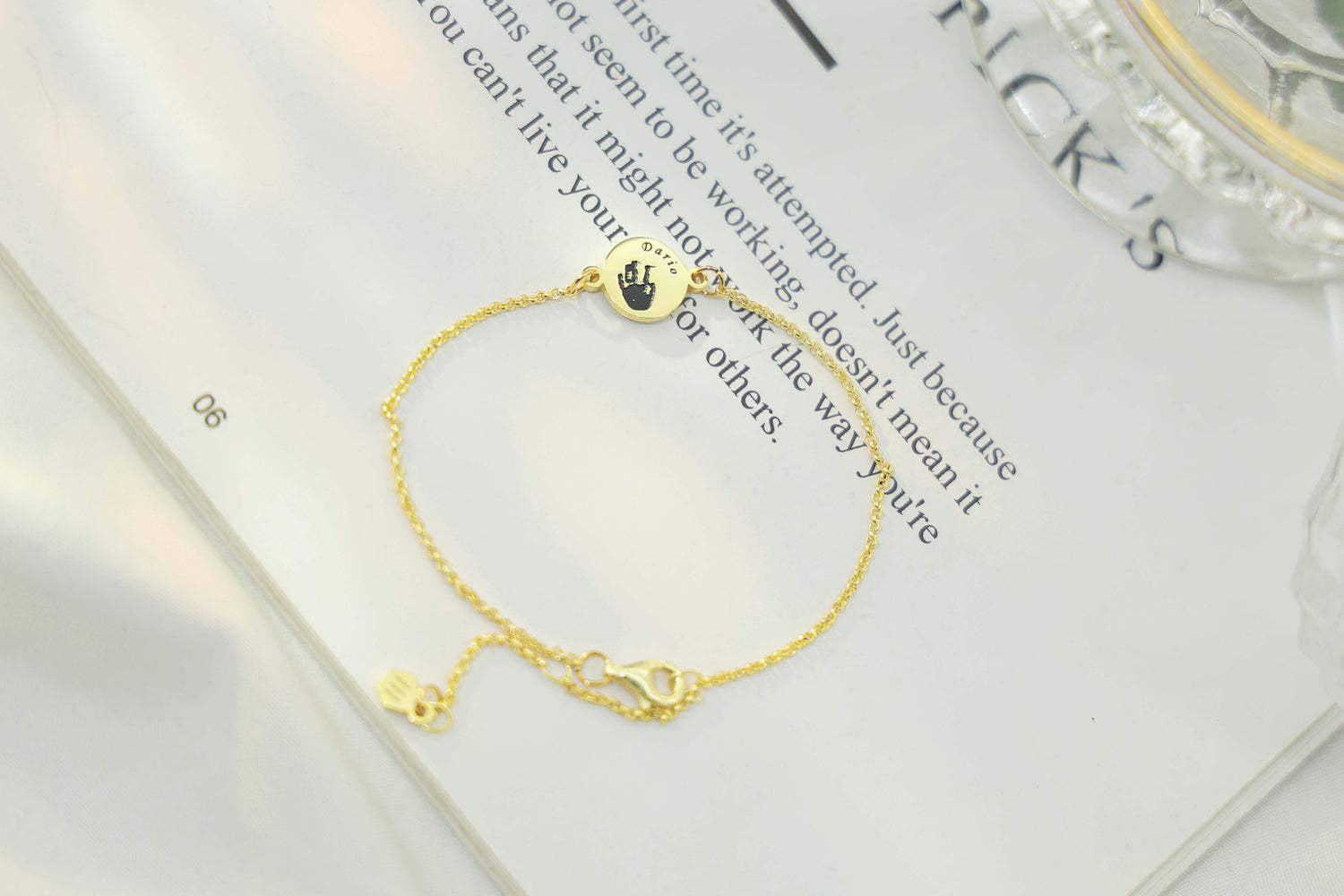 sterling Silver, gold plated bracelet engraved with a handprint and name — personalized bracelet by Chapters of Joy.
