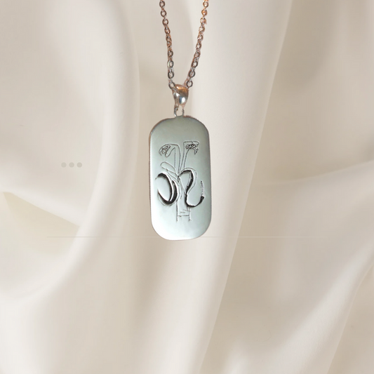 Sterling silver dog tag pendant with engraved hand-drawn art — personalized men’s jewelry by Chapters of Joy.
