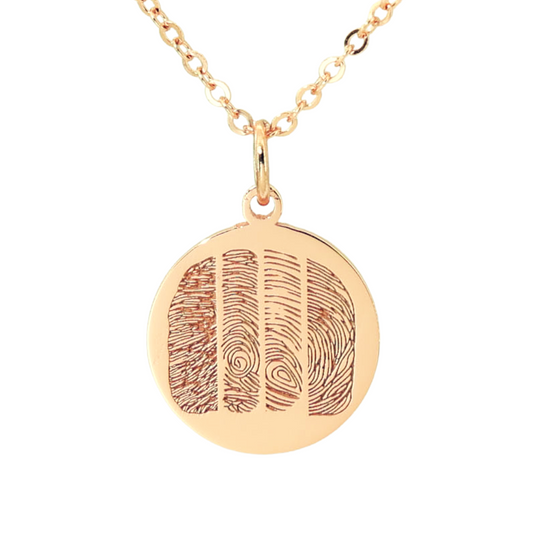 Sterling silver, gold plated pendant engraved with four unique fingerprints on the front and personalized with inscription and Roman numeral dates.
