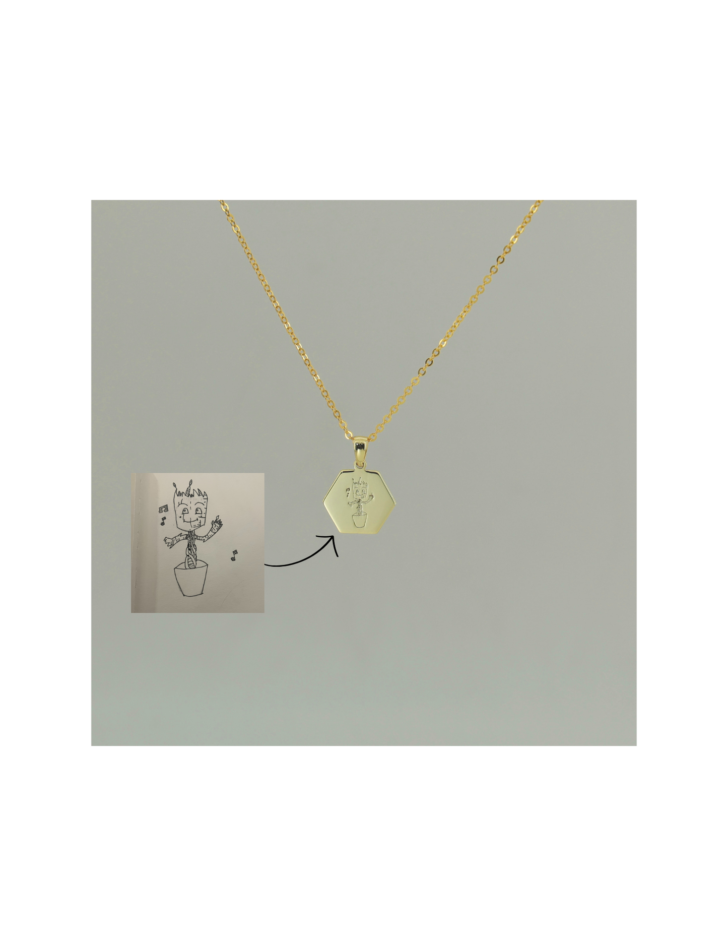 Meli hexacone pendant with actual drawing engraved on it in gold plated. Made by CHapters of Joy