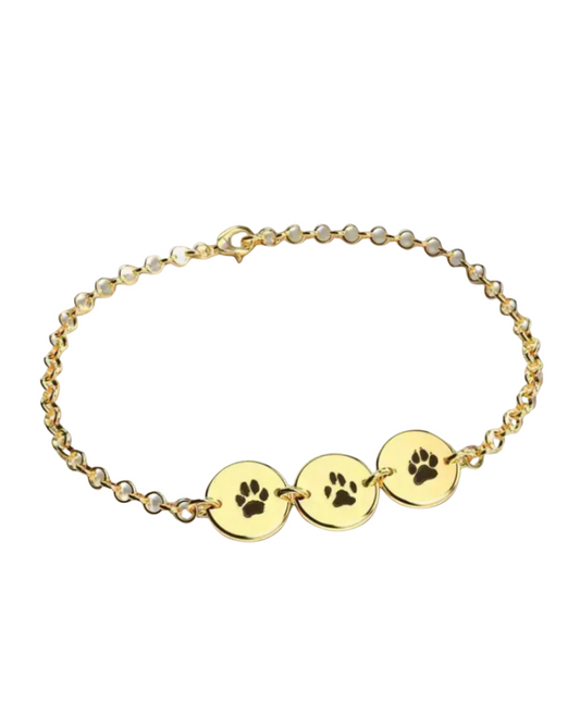 Gold plated, Sterling silver bracelet engraved with three pet paw prints — custom personalized keepsake jewelry from Chapters of Joy.
