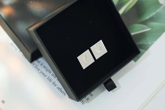 Personalized silver cufflinks with hand and footprint engraving