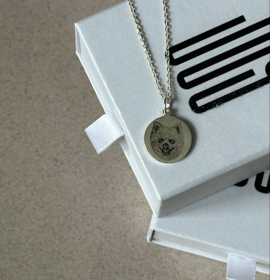 Sterling silver pendant engraved with a  portrait — custom memorial necklace.