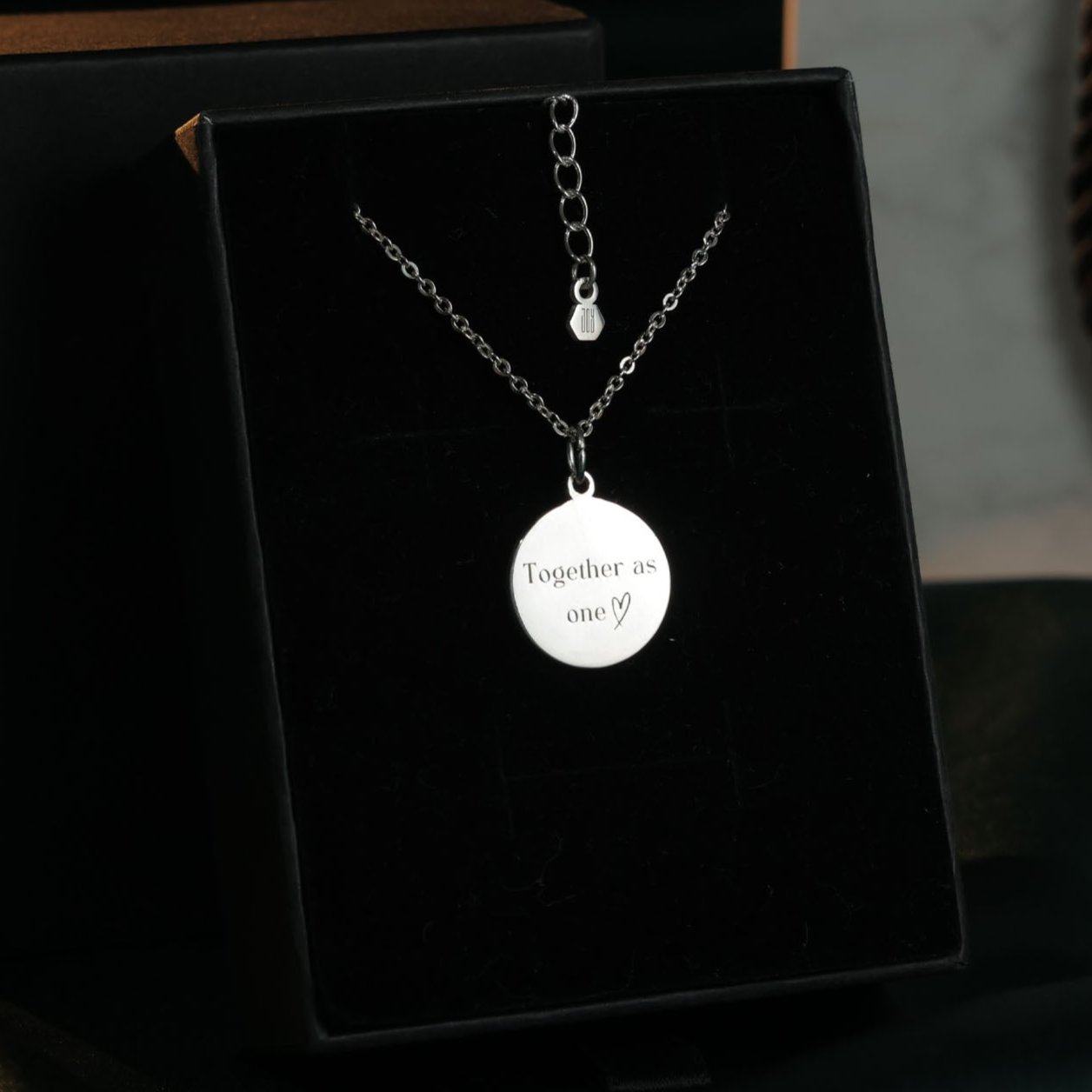Custom engraved pendant with fingerprints and ‘Together as one’ inscription in sterling silver