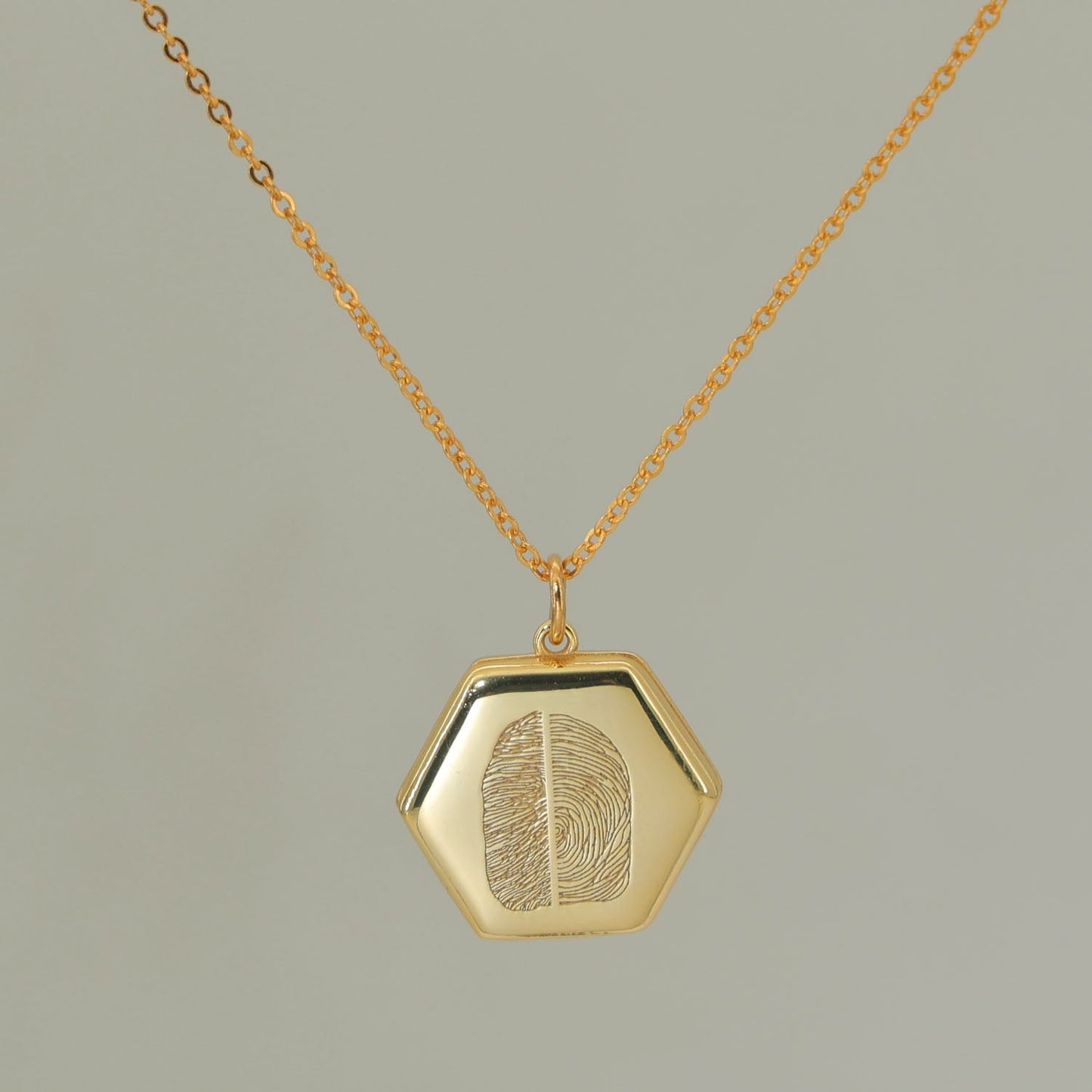 Double fingerprint locket with photo and custom engraving — sentimental gold-plated jewelry made by Chapters of Joy.