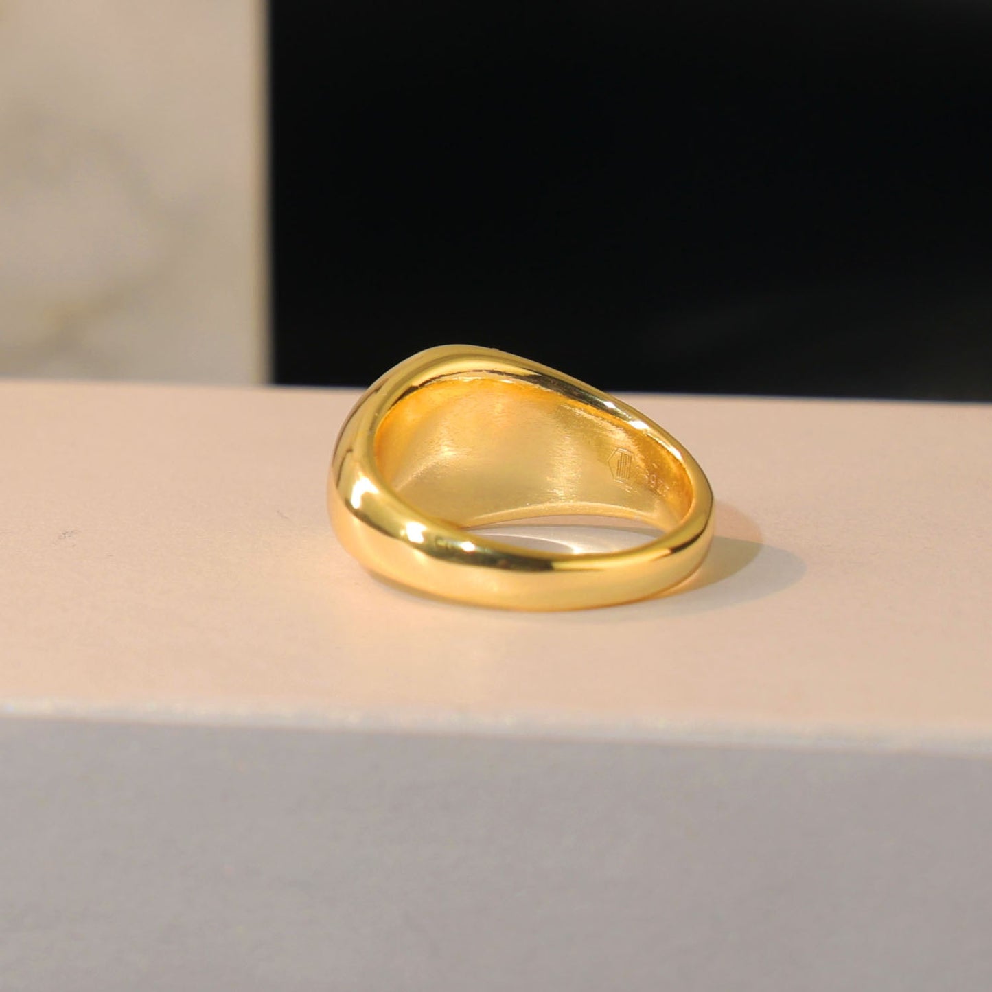 Elegant fingerprint signet ring crafted in recycled sterling silver and 14k gold.