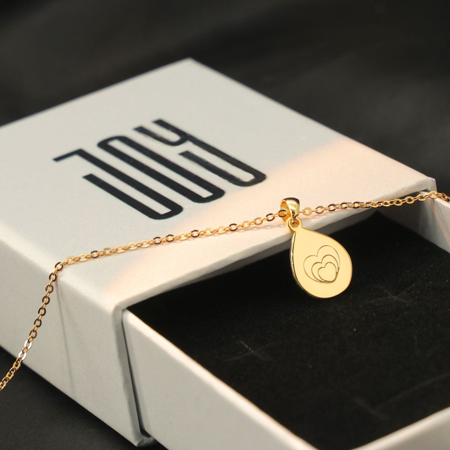 Personalized engraved heart pendant with custom message