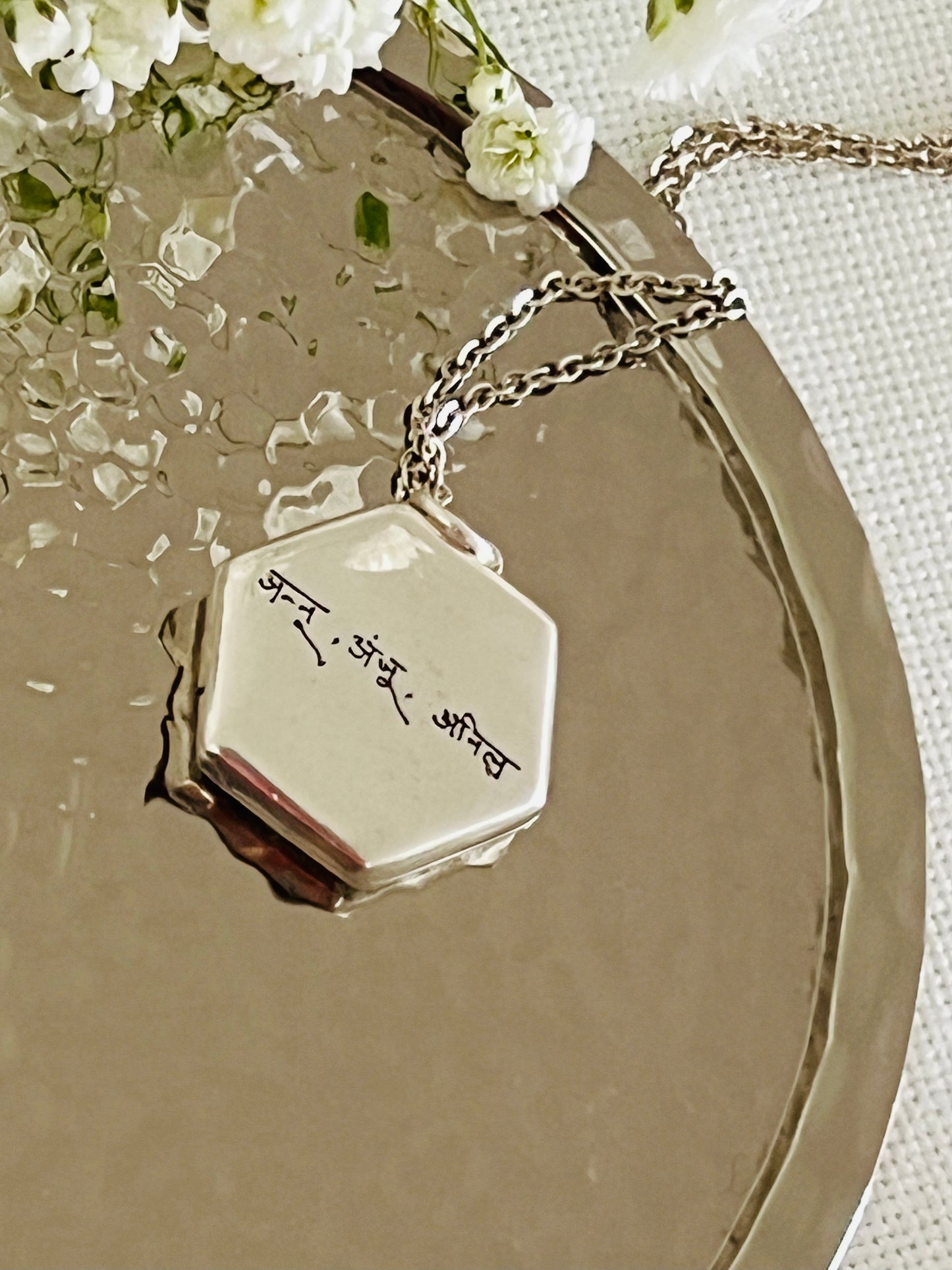 Sage Locket in sterling silver engraved with children’s names in late father’s handwriting in Hindi