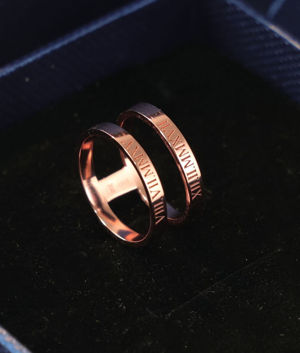 Hands gently cleaning a brass bracelet with soft cloth and mild soap; simple, safe jewelry care at home to restore shine.