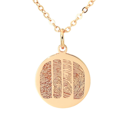 Sterling silver, gold plated pendant engraved with four unique fingerprints on the front and personalized with inscription and Roman numeral dates.
