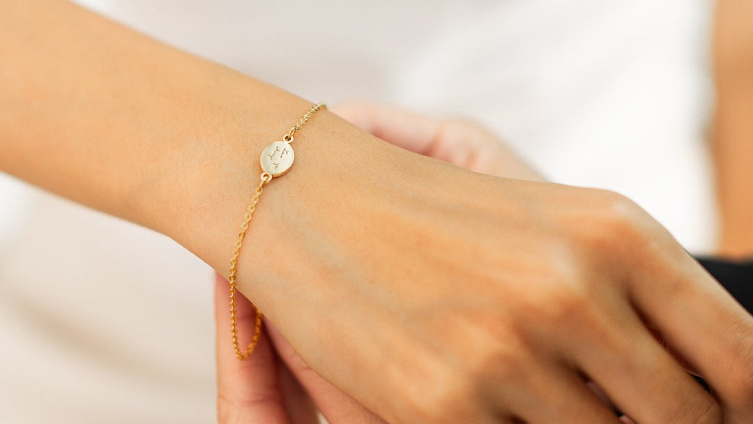 Gold bracelet engraved with personal handwriting