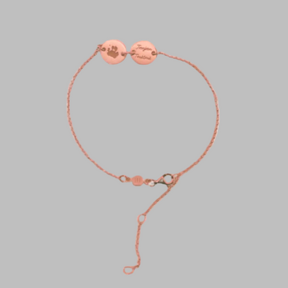 Rose Gold bracelet engraved with pet paw print and name. great custom keepsake jewelry from Chapters of Joy.