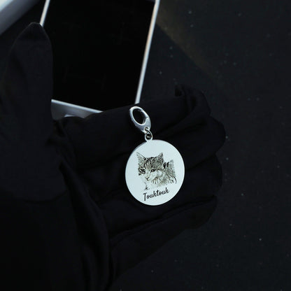 Sterling silver Duo Tag engraved with the second cat face, symbolizing the bond between beloved companions.