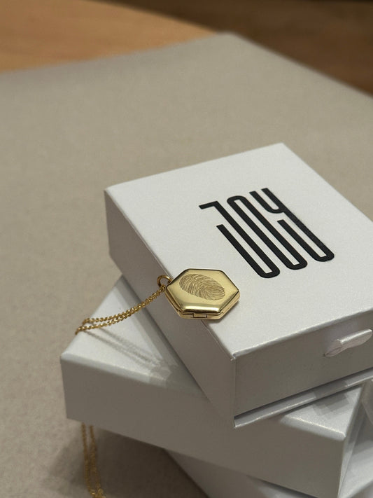 Cora Locket in sterling silver gold plated with fingerprint engraving and personalized message