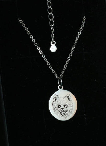 Custom engraved pendant with dog portrait and paw print