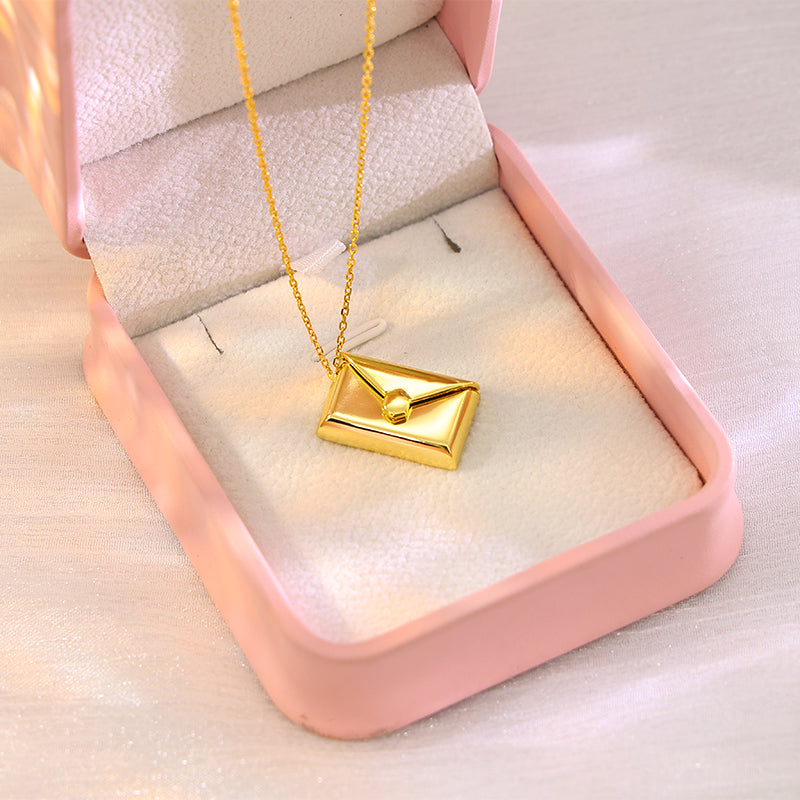 envelope locket open showing engraved paw print keepsake