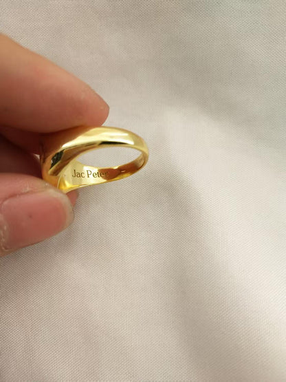 Gold plated signet ring engraved with a loved one’s handprint. inside is Jac Peter engraved