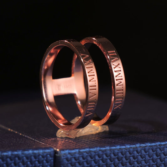 two connected Silver, rose gold plated ring engraved with Roman numerals representing two special dates.