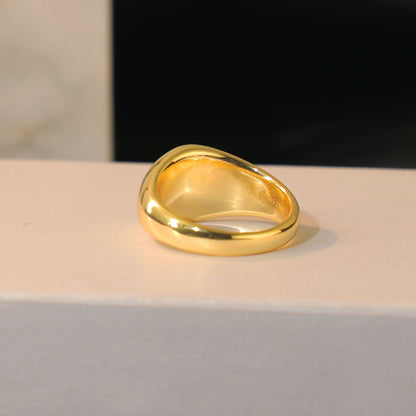 Elegant fingerprint signet ring crafted in recycled sterling silver and 14k gold.