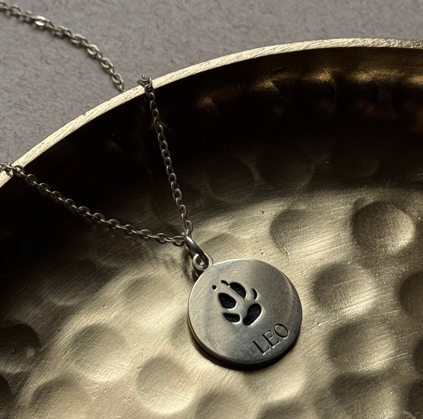 Leora Pendant necklace in sterling silver with engraved paw print and dog name