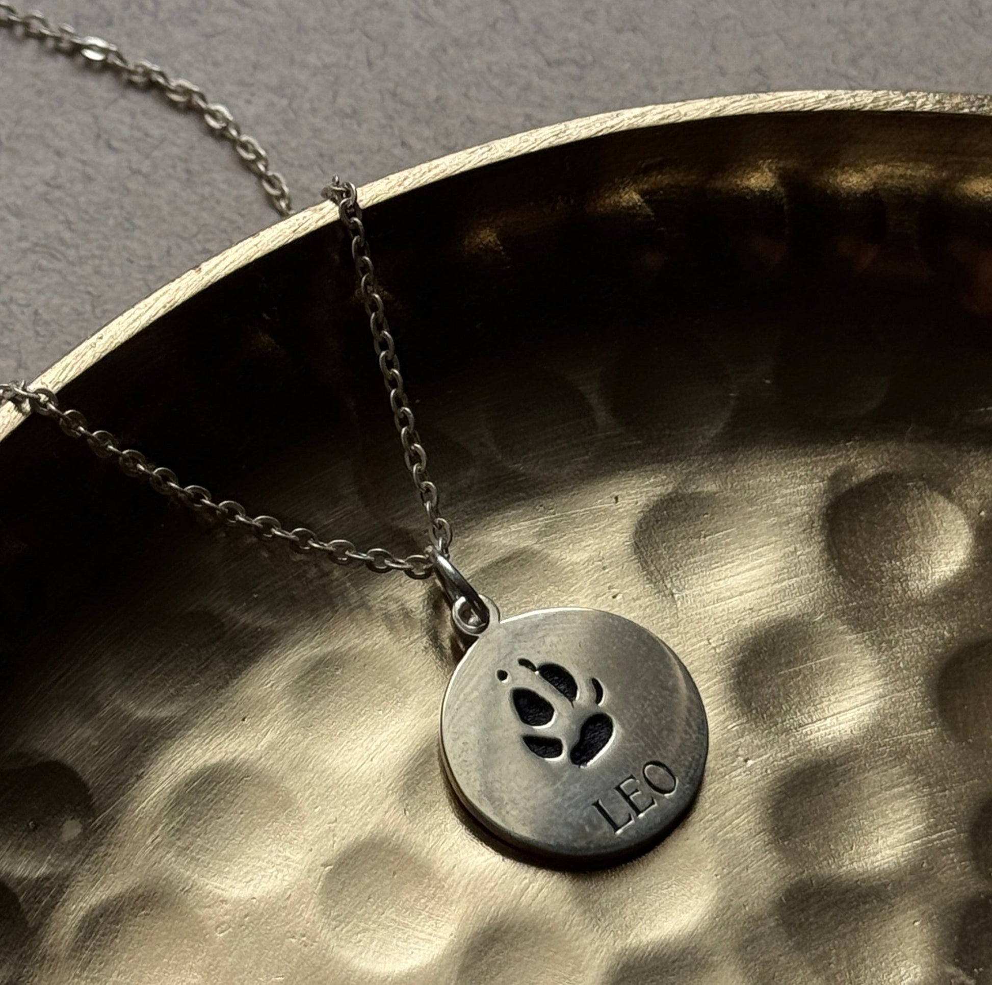 Leora Pendant necklace in sterling silver with engraved paw print and dog name