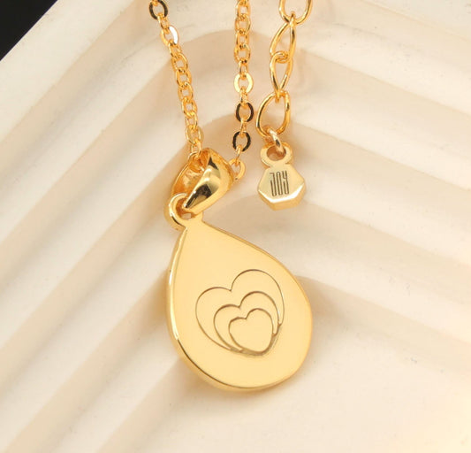 Triana Pendant necklace in sterling silver gold plated with three intertwined hearts