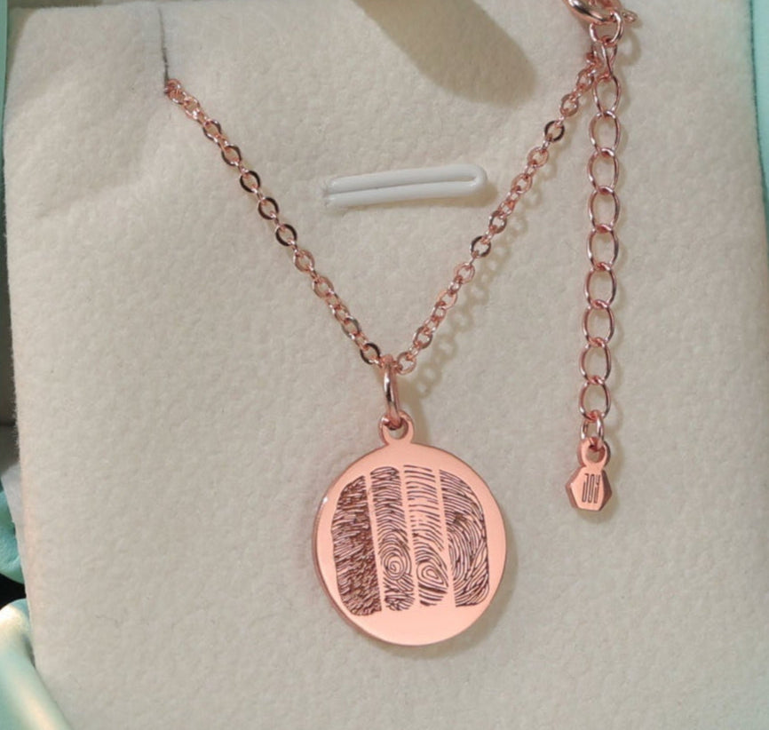 Rose Pendant keepsake necklace with four engraved fingerprints. Sterling silver and rose gold plated.