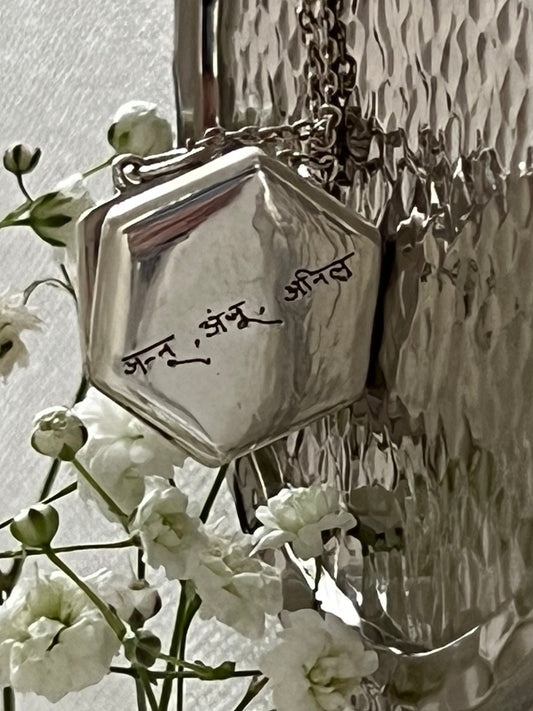 Sage Locket in sterling silver engraved with children’s names in late father’s handwriting in Hindi