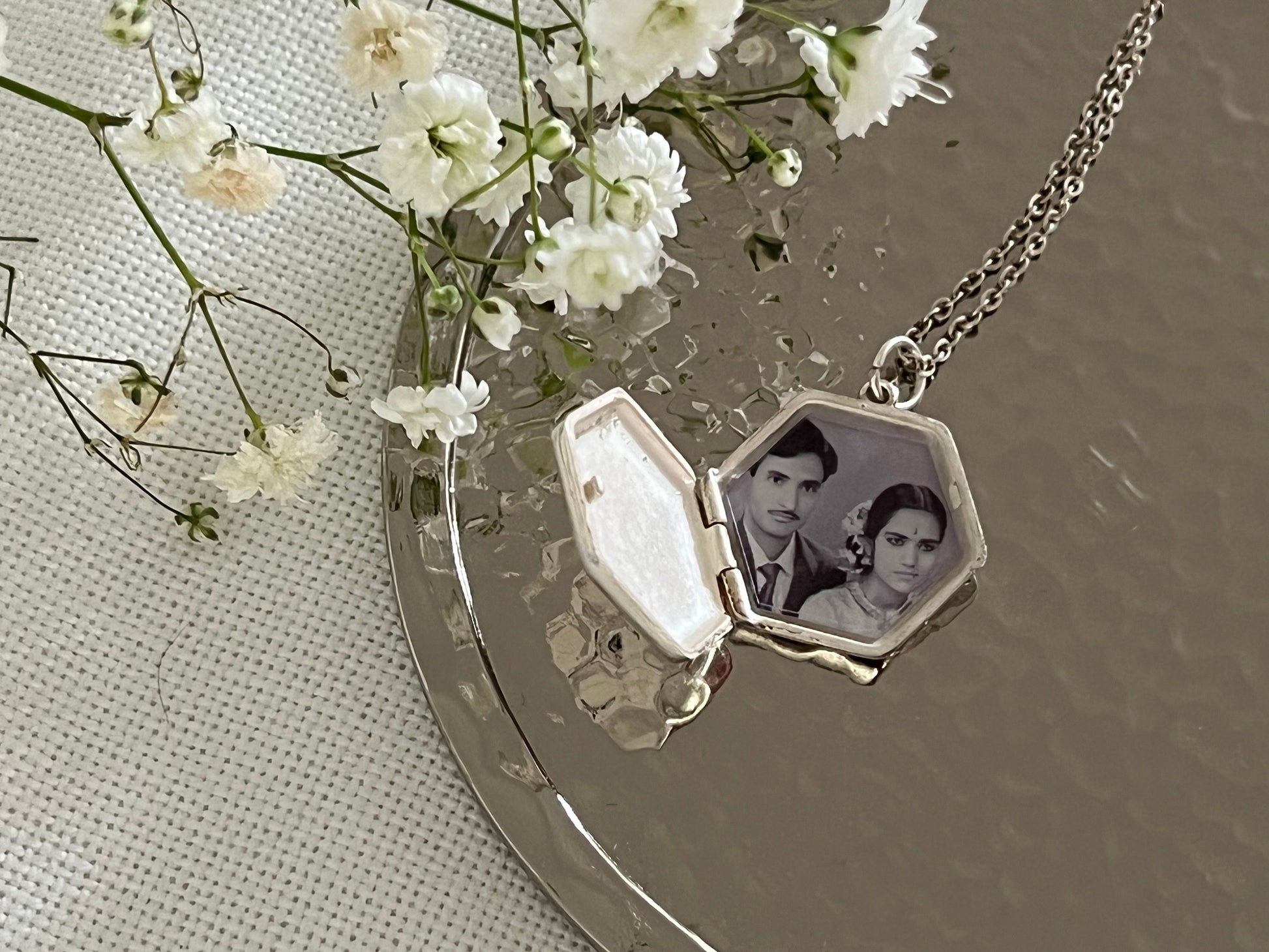 age Locket open with UV-engraved photo of parents inside