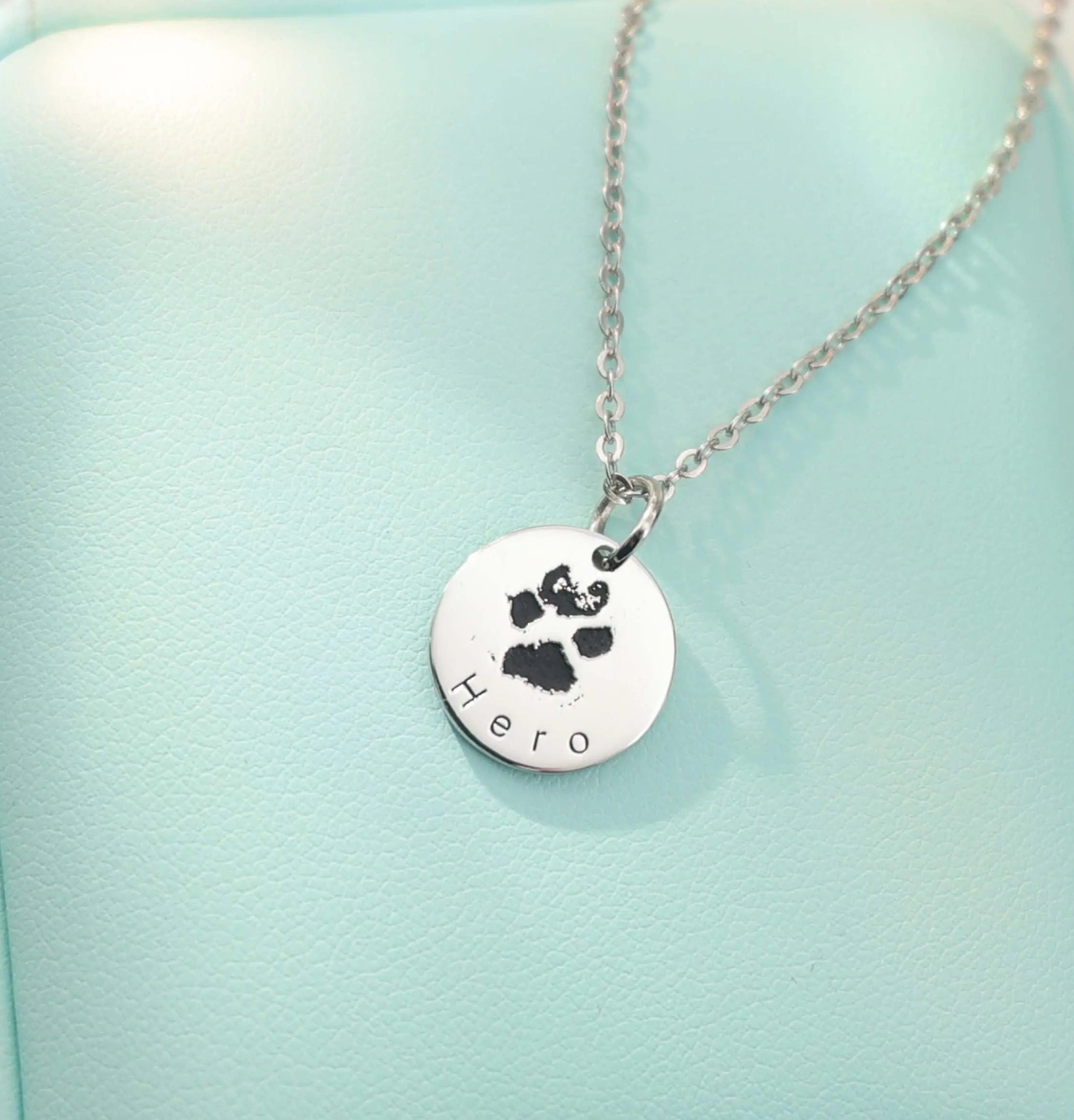 sterling_silver_pendant_engraved_with_a_custom_paw_or_nose_print_personalized_pet_keepsake_necklace..jpg?v=1778691978